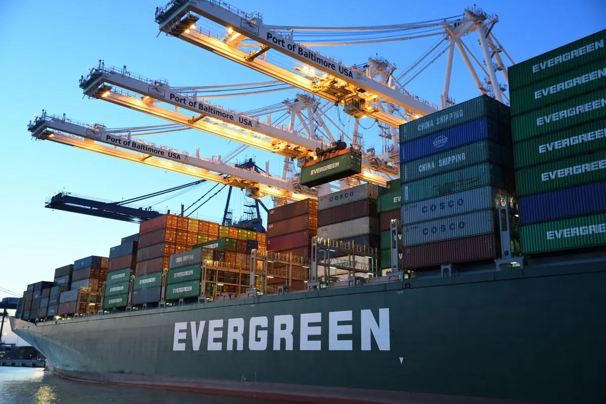Aerial view of a container port with giant cranes